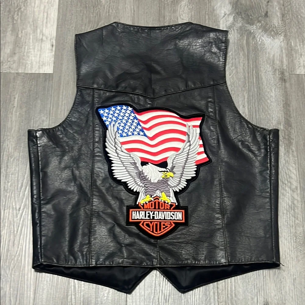 Frontier Leather Men’s Vest w/ the “Harley Davidson” patch on the back. Size 42
